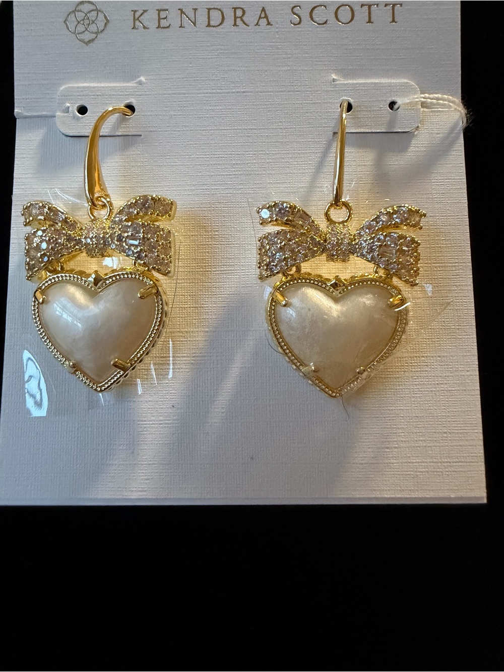 Kendra Scott Gold and White Heart Drop Earrings with Crystal Bow